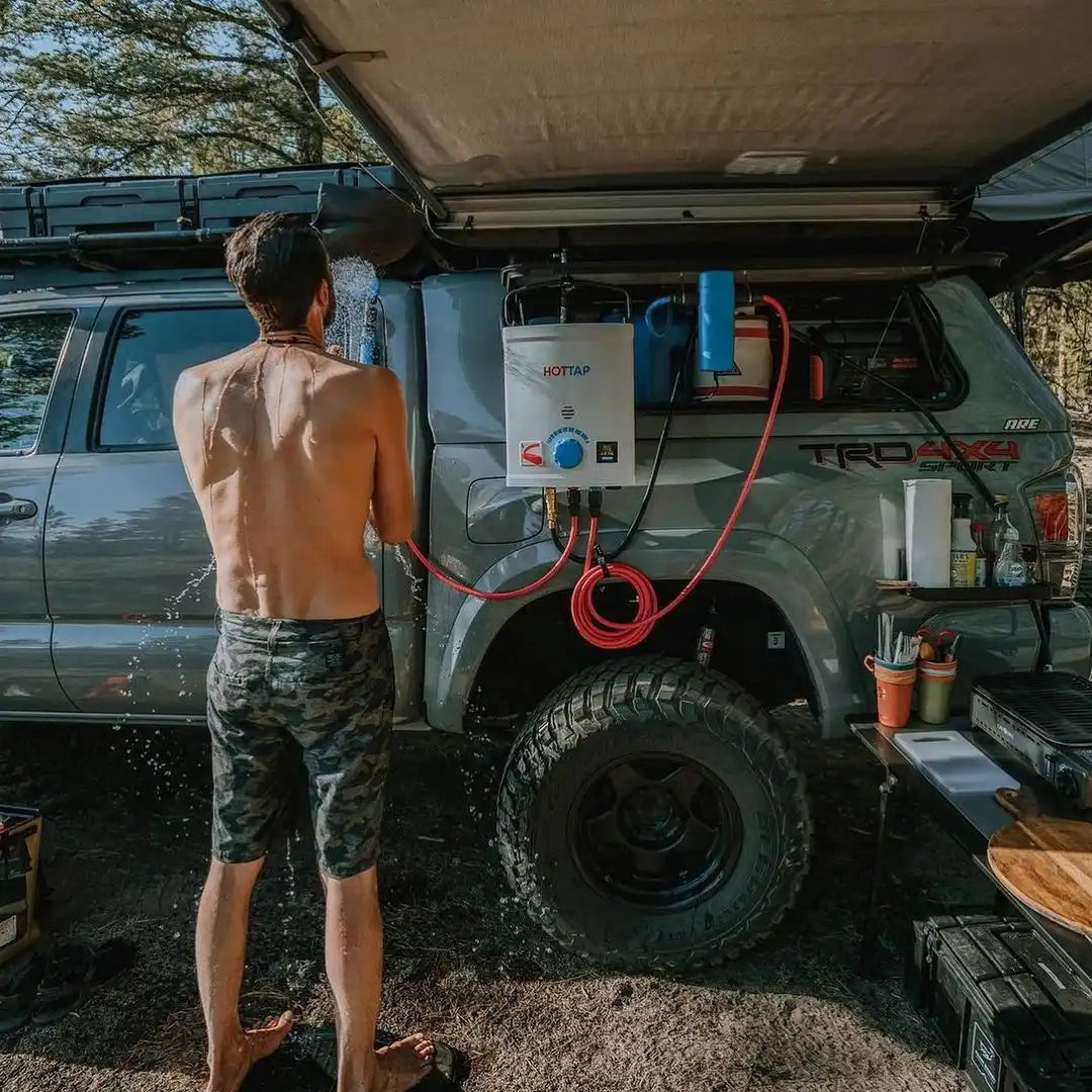 Portable camping shower system.